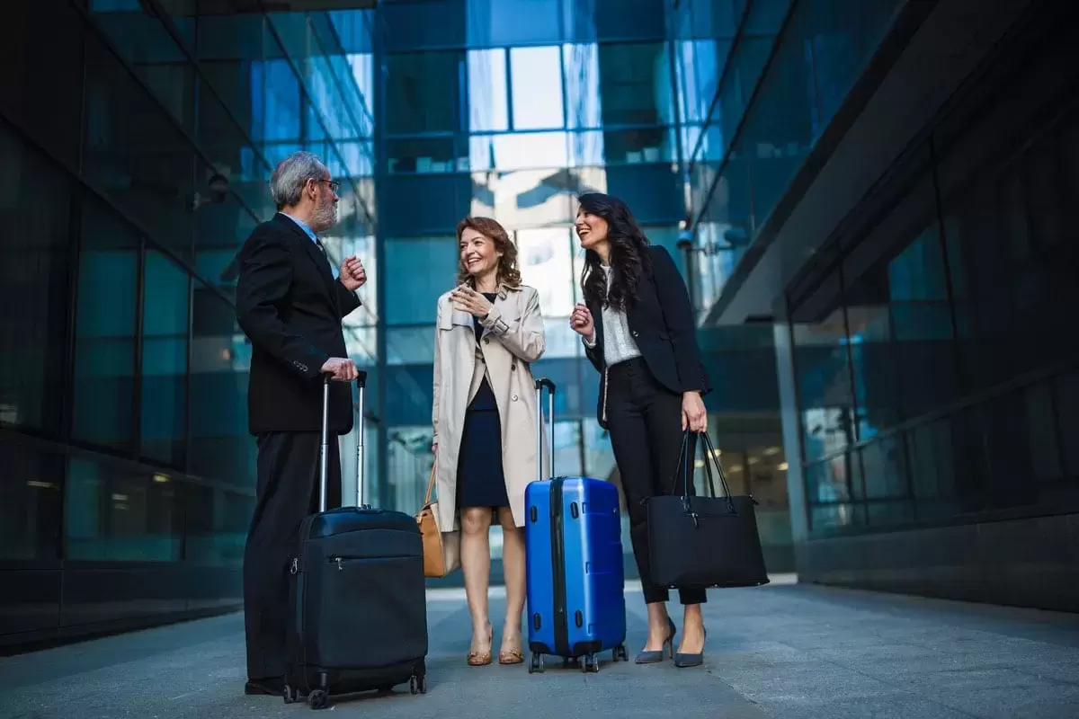 Corporate people with suitcases